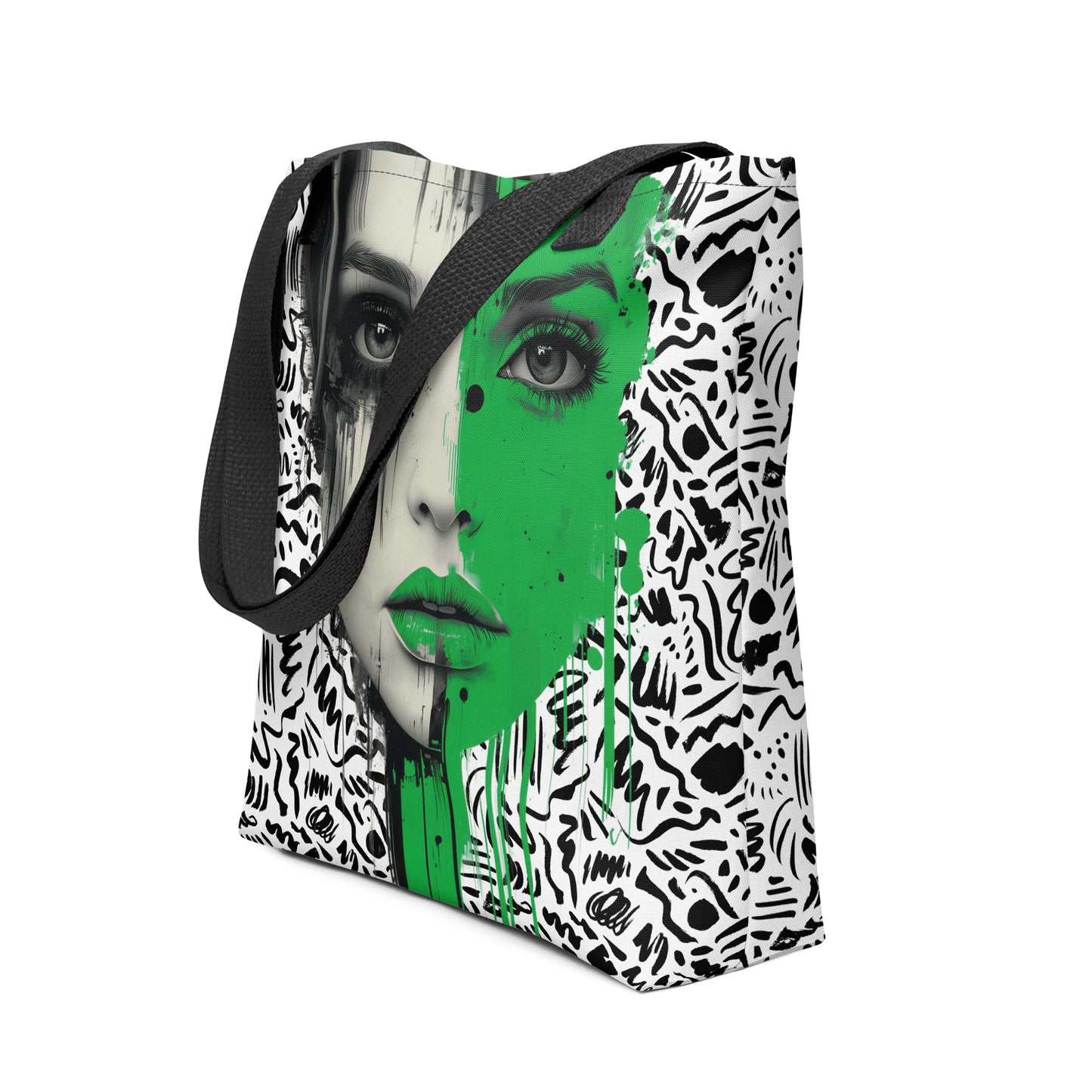 Urban chic tote bag featuring a design of a woman's face with one half in bold, outrageous green, framed by a dynamic black and white pattern. Empowered women, empower women.
